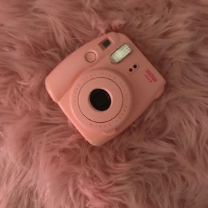 Polaroid camera plus the photo collector.